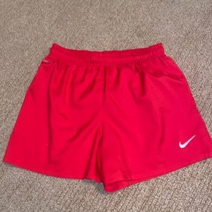 Red Nike Track Shorts (size small)